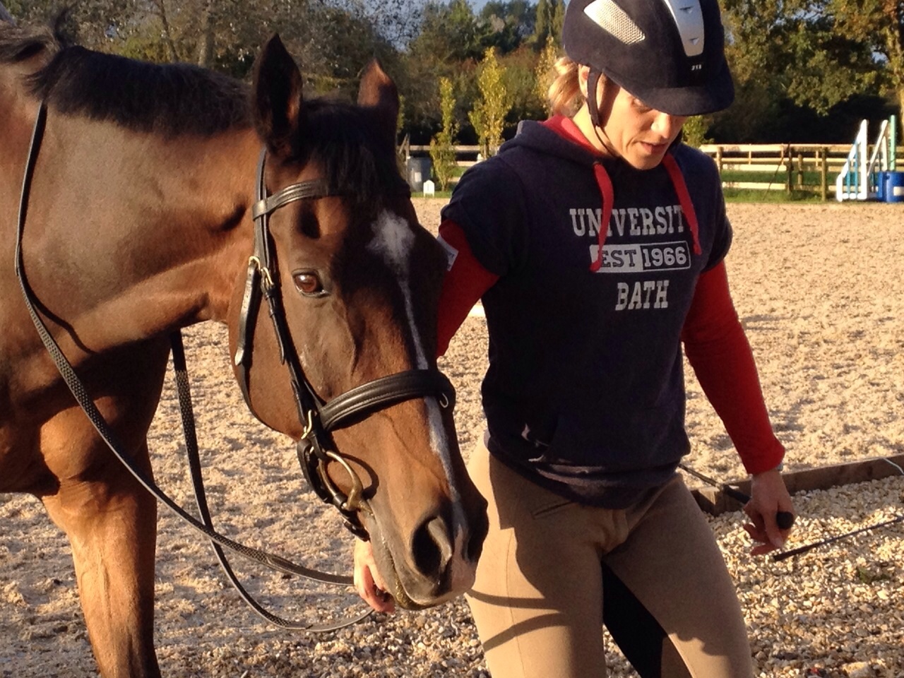 Marianne leading a horse