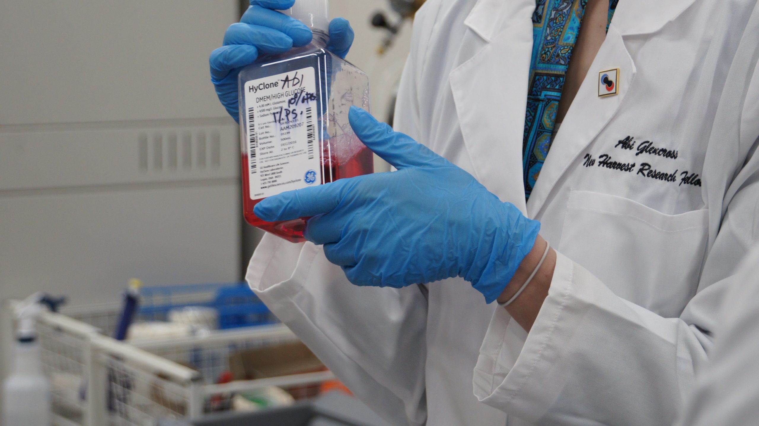 Abi Glen cross showing a vial in the lab
